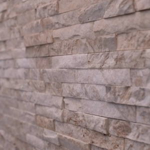 Stacked Stone on Staircase Wall