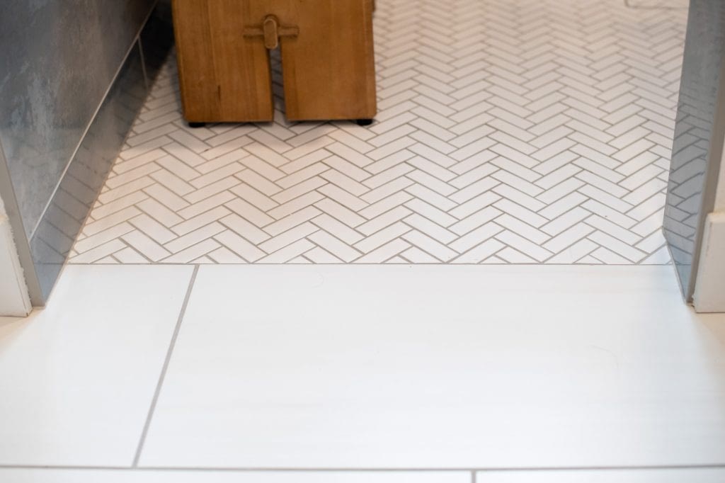 primary shower floor tile festival white glossy herringbone mosaic