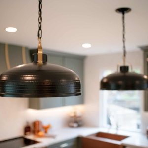 Close-up of matte-brass pendant light
