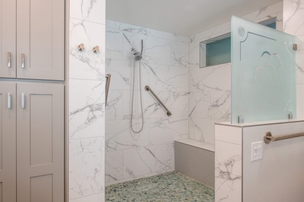 San Diego trend Bathroom with no-step shower, grab bars, and a bench for aging-in-place
