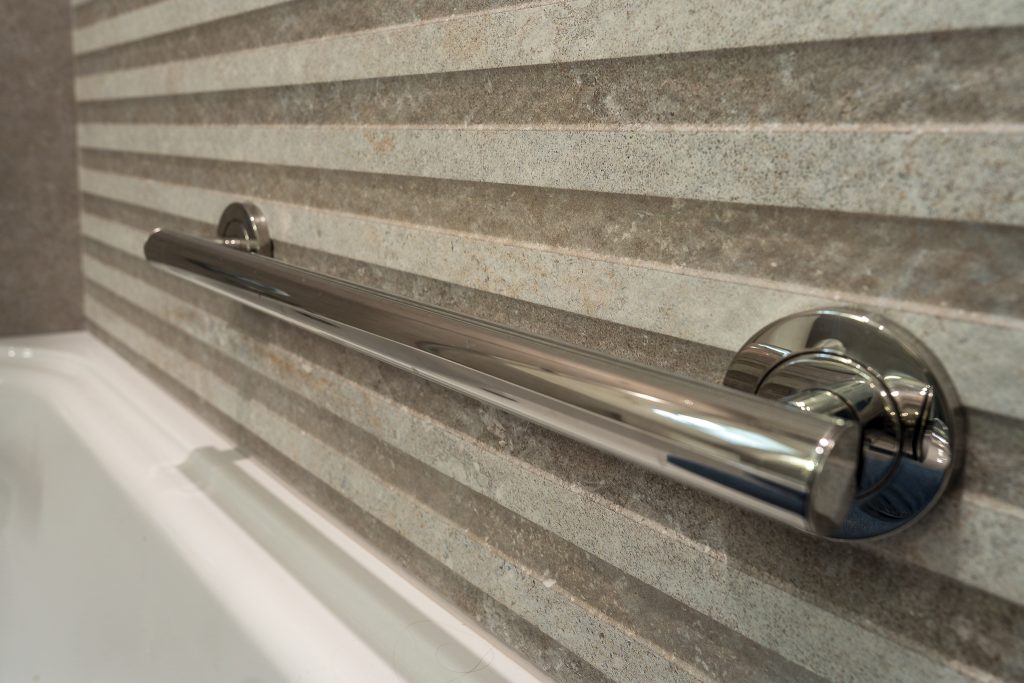 Tub safety grab bar on textured Hannover Bone Topo tile