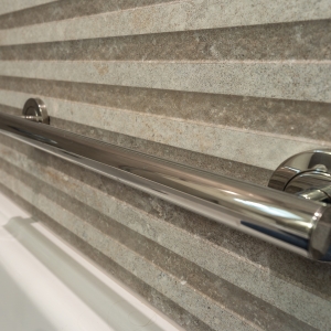 Tub safety grab bar on textured Hannover Bone Topo tile