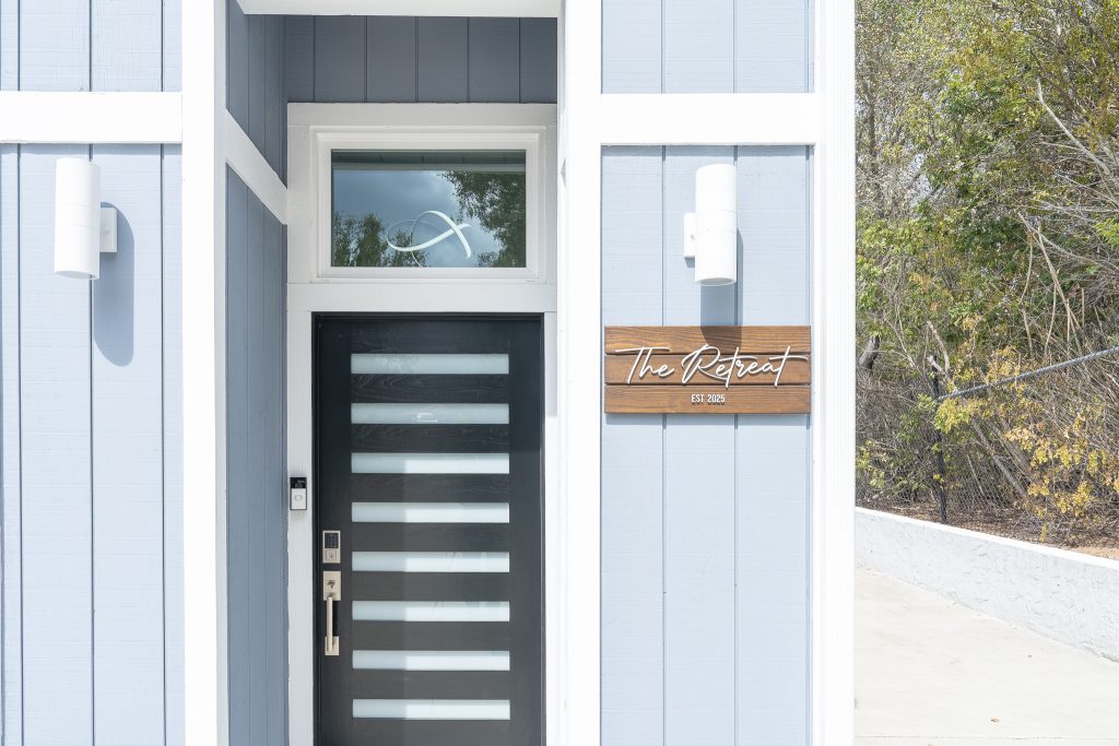 &ldquo;The Retreat&rdquo; entry sign