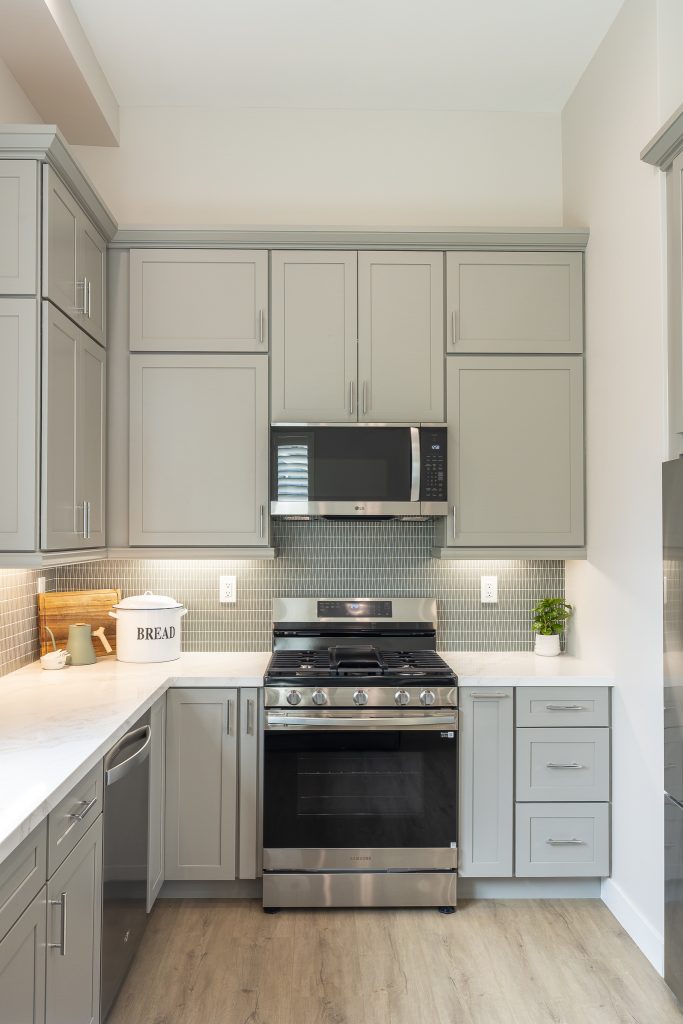 Full elevation of range wall with shaker uppers