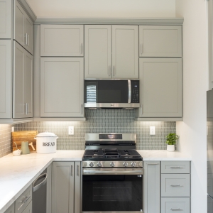 Full elevation of range wall with shaker uppers