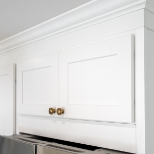 Crown moulding above built-in refrigerator surround