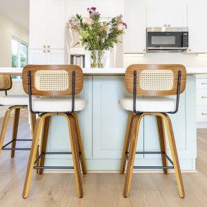 Island seating with soft green base and cane stools
