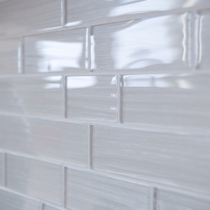 Close-up of Elysium Casale mosaic backsplash tile with glossy texture