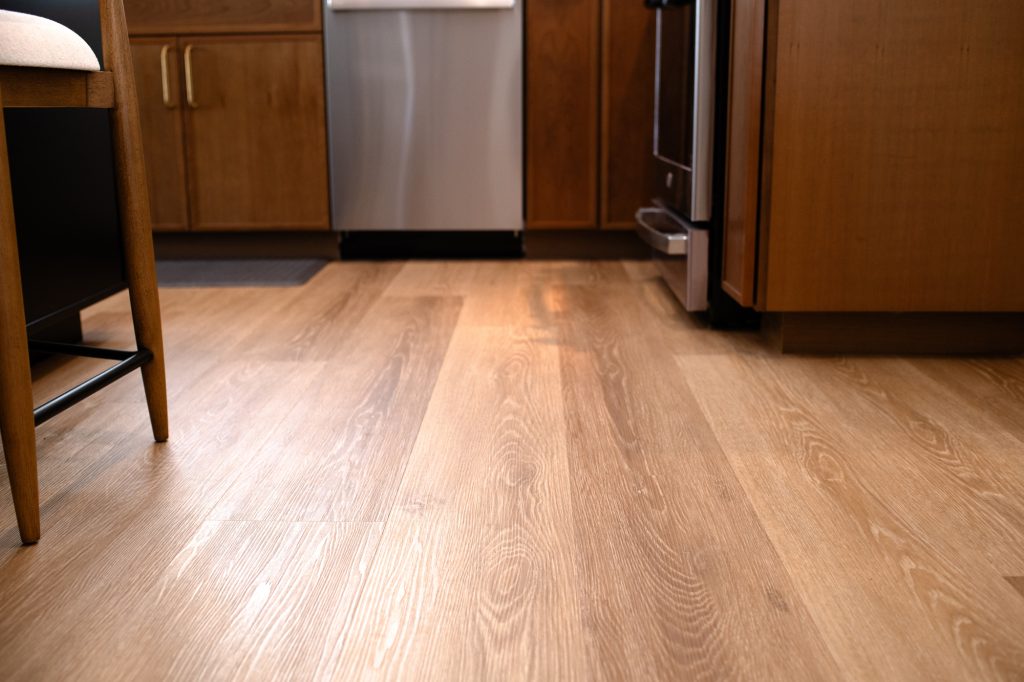 Light wood flooring in the remodeled kitchen