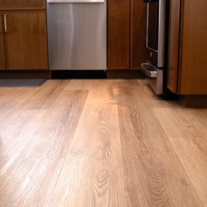 Light wood flooring in the remodeled kitchen