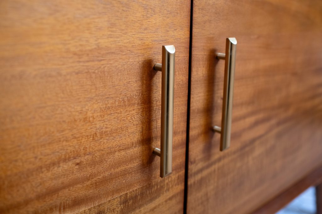 Brass cabinet pulls on the primary bathroom vanity